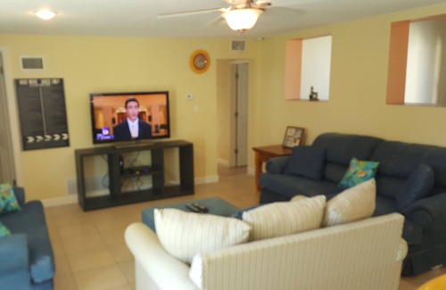 Ormond Beach Plaza House | Pet Friendly Beach House With Pool. The beach is just a 1 min walk.