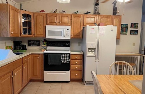 Broadkill Beach House | Pet friendly, Broadkill Beach rental with a large screened in area and open deck!