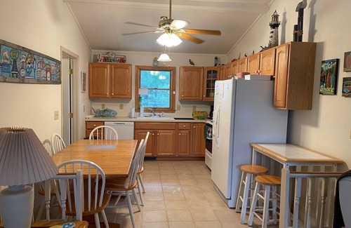 Broadkill Beach House | Pet friendly, Broadkill Beach rental with a large screened in area and open deck!