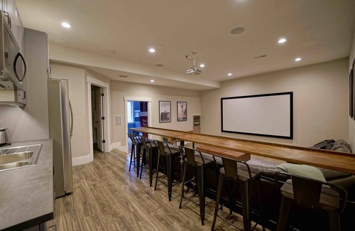 Kamas House | Pet-friendly cabin with theater, fire pit, spa, sauna, game room and playground