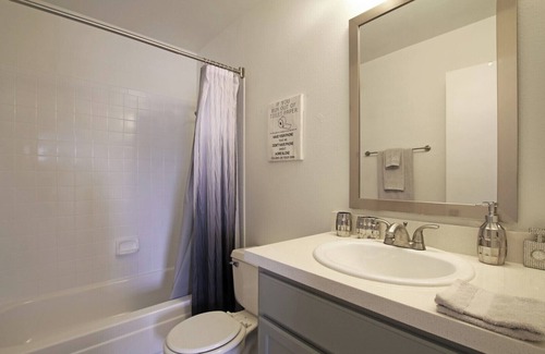 Henderson House | Pet-friendly home with 4 spacious bedrooms, 10 minutes to hospitals, college.