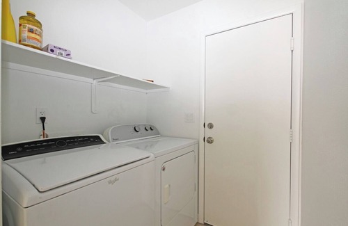 Henderson House | Pet-friendly home with 4 spacious bedrooms, 10 minutes to hospitals, college.