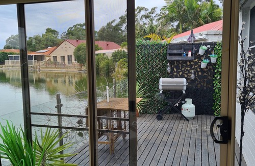 South Yunderup House | Pet friendly, Lakeside retreat private secluded waterfront cottage with spa
