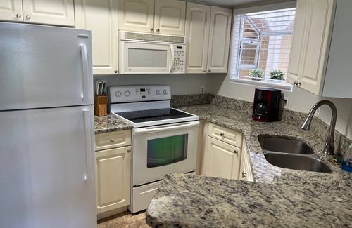 Ocean Side Village Condo | Pet Friendly - Melbourne Beach Condo [Wheelchair Accessible]
