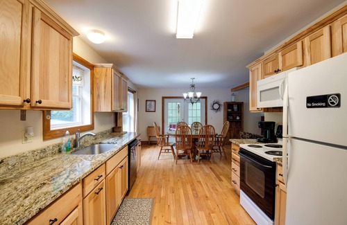 Lake George House | Pet Friendly Red House: Short Walk to Private Dock & Lake George!