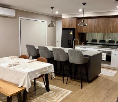 Karaka House | Pet Friendly Riverfront Minimalist Karaka Stay Prime Location