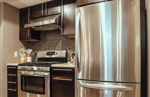 South Side Slopes Apartment | Pet-Friendly Southside Getaway - Sleeps 12