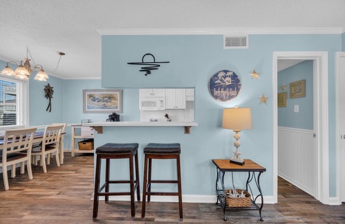 Ocean Drive Cottage | Pet Friendly Ocean View Cottage - Outdoor Pool - Walk to main street