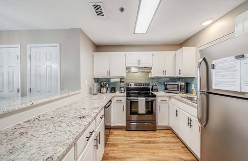 Bahama Beach Condo | Pet Friendly Condo, steps to the sand