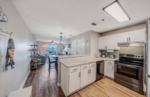 Bahama Beach Condo | Pet Friendly Condo, steps to the sand