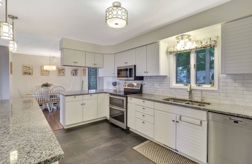 Petoskey House | Petoskey Home with Little Traverse Bay Views | Sleeps 8 | Wrap Around Deck