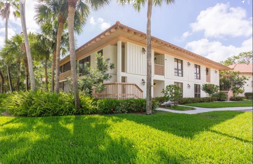 Hunt Club Condo | PGA National Resort Golf Villa - Luxurious Two Bedroom First Floor Water View