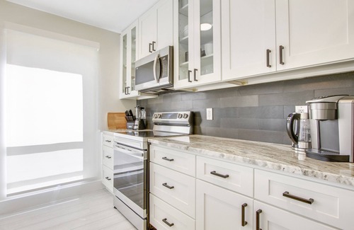 Hunt Club Condo | PGA National Home. Fountain Views.