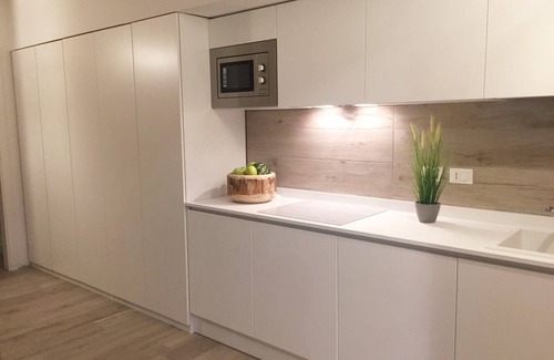 Faro Apartment | PIAZZA NEMBER MARINA PONENTE WITH PRIVATE GARDEN