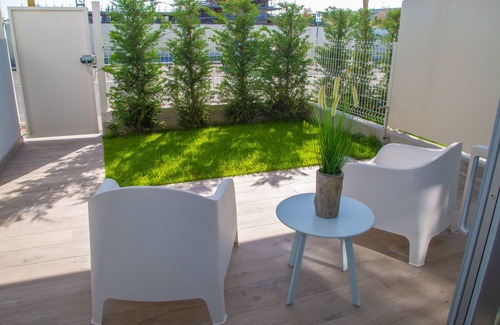 Faro Apartment | PIAZZA NEMBER MARINA PONENTE WITH PRIVATE GARDEN