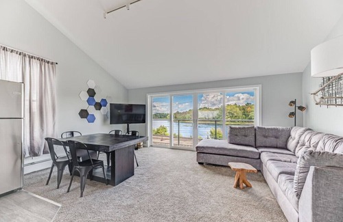Costigan Apartment | Picturesque Riverfront | 4 BD | Parking Provided
