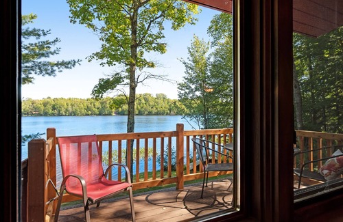 Presque Isle Cabin | Picturesque waterfront cabin w/a deck, firepit, & recreational pier