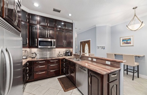 Banana River Estates House | Pier Beach House! Heated Pool, Spa, Steps to Sand
