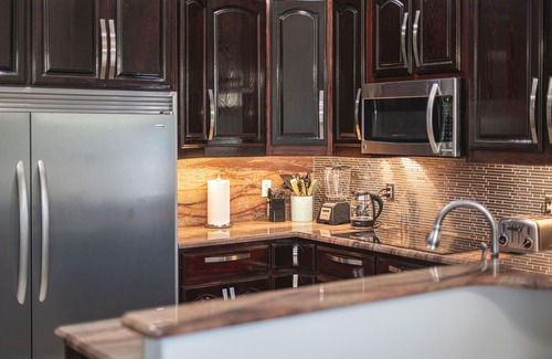 Banana River Estates House | Pier Beach House! Heated Pool, Spa, Steps to Sand