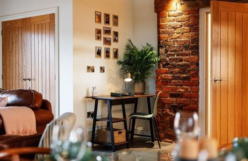 Pontesbury House | Pigeon House - Unique Barn with private garden, hot tub and wood burner