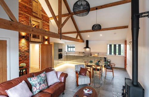 Pontesbury House | Pigeon House - Unique Barn with private garden, hot tub and wood burner