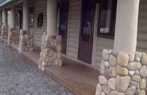 Gaylord House | Pine Cone Inn - Room M9 with 2 Double beds located across from Otsego Lake.