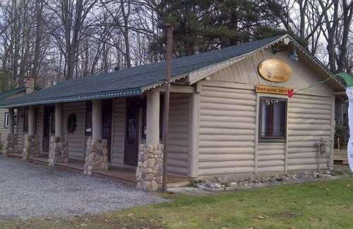 Gaylord House | Pine Cone Inn - Room M9 with 2 Double beds located across from Otsego Lake.