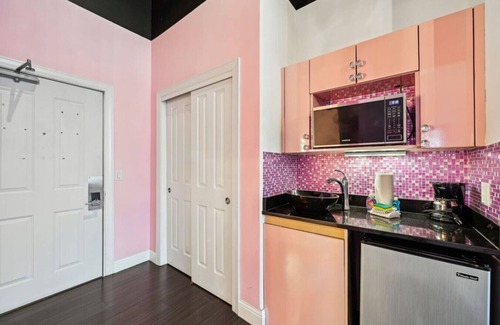Lake Delton Condo | Pink Beachfront Condo at Delton Grand