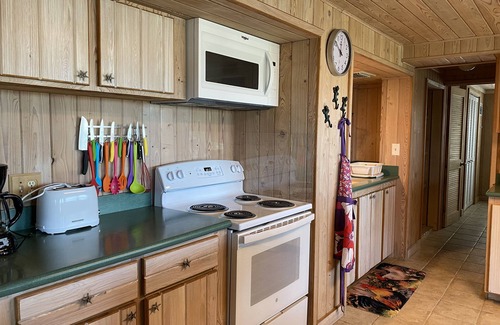 Treasure Cay Apartment | Pink Bikini Apartment with Dock, Green Turtle Cay