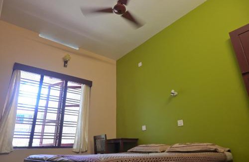 Kovalam Hotel | Pink Flower Tourist Home
