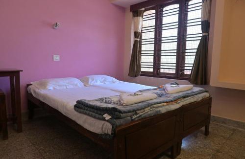 Kovalam Hotel | Pink Flower Tourist Home