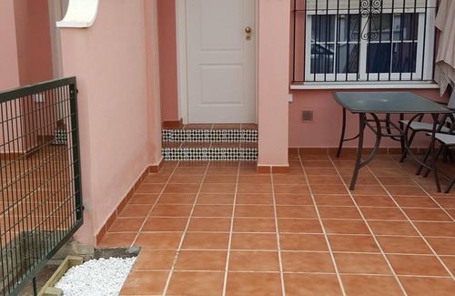 San Juan de los Terreros House | Pink house with pool