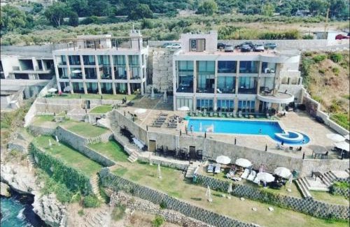 Kfardebian Hotel | Pink Sunset Beachfront Exotic Room in Batroun