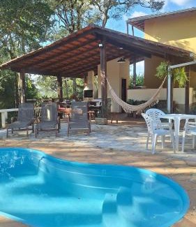 Sao Sebastiao das Aguas Claras House | PISCINA AQUECIDA, 5 SUÍTES, trilha privativa até o riacho, Wi-fi, estacionamento, ampla área externa cercada de natureza exuberante - 200m do vilarejo