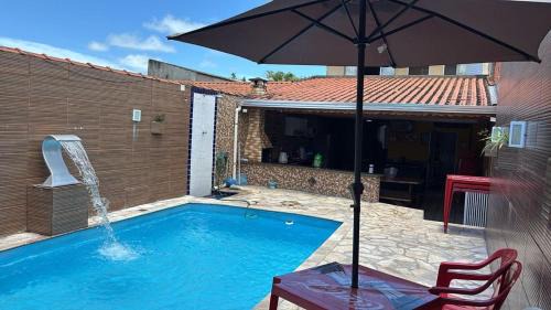 Mongagua House | Piscina, Churrasqueira, Ar Condicionado e 3 Vagas de Garagem