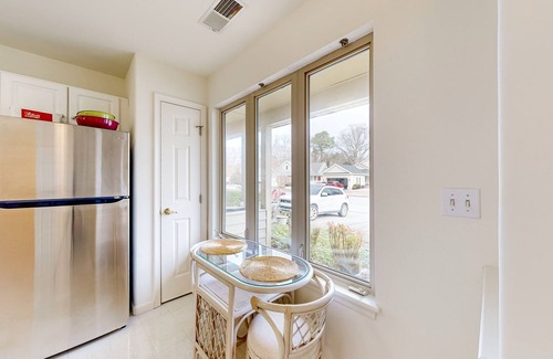 Lewes House | Plantations East dog-friendly townhouse with fireplace & water view