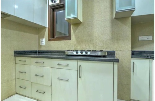 Block E Apartment | Pleasant 3BHK Apartment Park Facing, Close to Market By HostMyStay