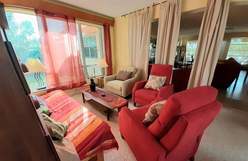 Lake Worth Corridor House | Plumaria Room with private bathroom on shared lakeview House