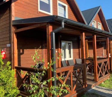 Wicie Resort | Pod Dębami Wicie- domki drewniane nad morzem