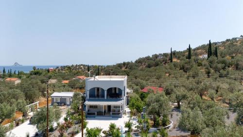 Galatas House | Poetree Echo by Green Poetree Houses