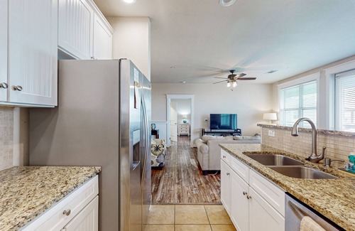 Red Fish Cove Condo | Pointe West getaway with pool, hot tub & bay-view balcony - walk to beach