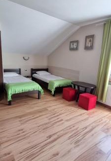 Łazy House | Pokoje w Zielonym Domku