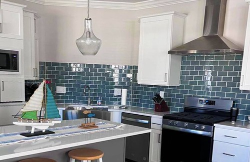 Marblehead Villa | Pool front in Lake Erie resort. Steps to the sandy beach, Golf cart included!