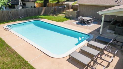 South Tulsa House | Pool Game Room Fireplace Single Story