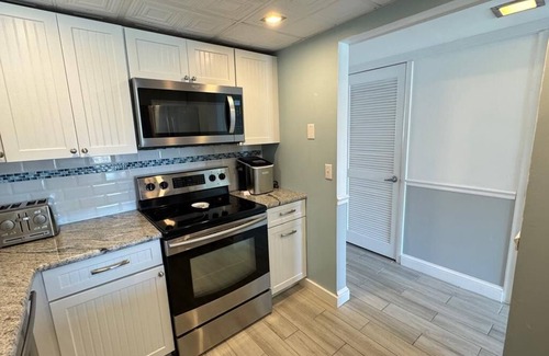 North Beach Haven Condo | Pool. Smart TV. WiFi. Beach Badges. Beach Chairs Patio.O/S. W/D. 140155