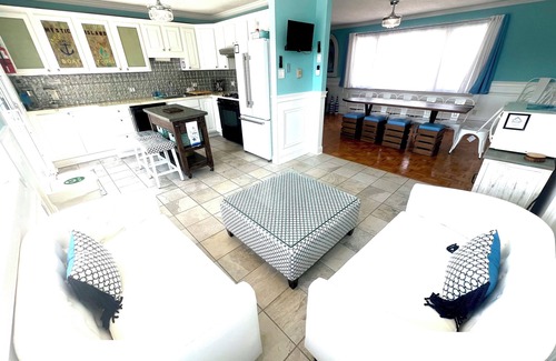 Osborn Island House | POOL, TIKI BAR, WATERFRONT home, 8 LBI Beach passes in Mystic Island NJ