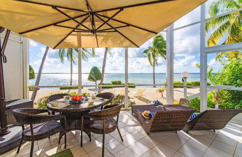Rum Point Apartment | Pools of the Kai 3 - Waterfront Condo with Private Pool Atrium, Walk to Restaurants