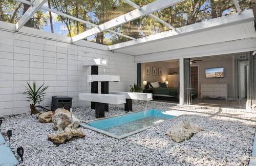 Beauclerc House | Poolside Game and Grille Retreat