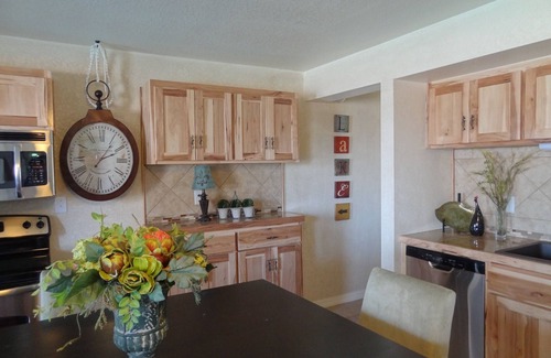 Mount Ida Apartment | Poolside King Cabana with full kitchen, king bed, sleeper sofa and pool access. by RedAwning