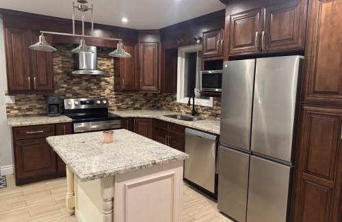Brampton West Villa | Poolside Retreat with Private Patio